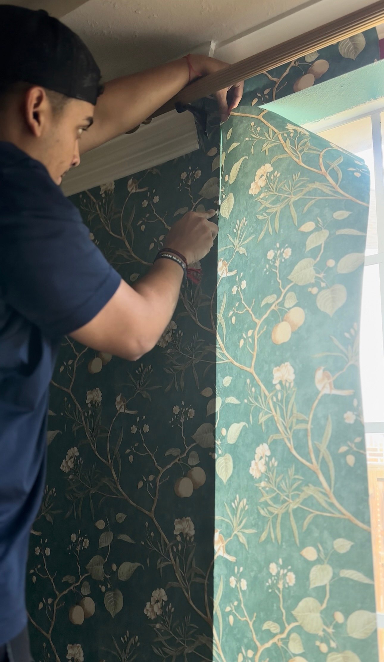 Professional installer aligning seams for a perfect finish