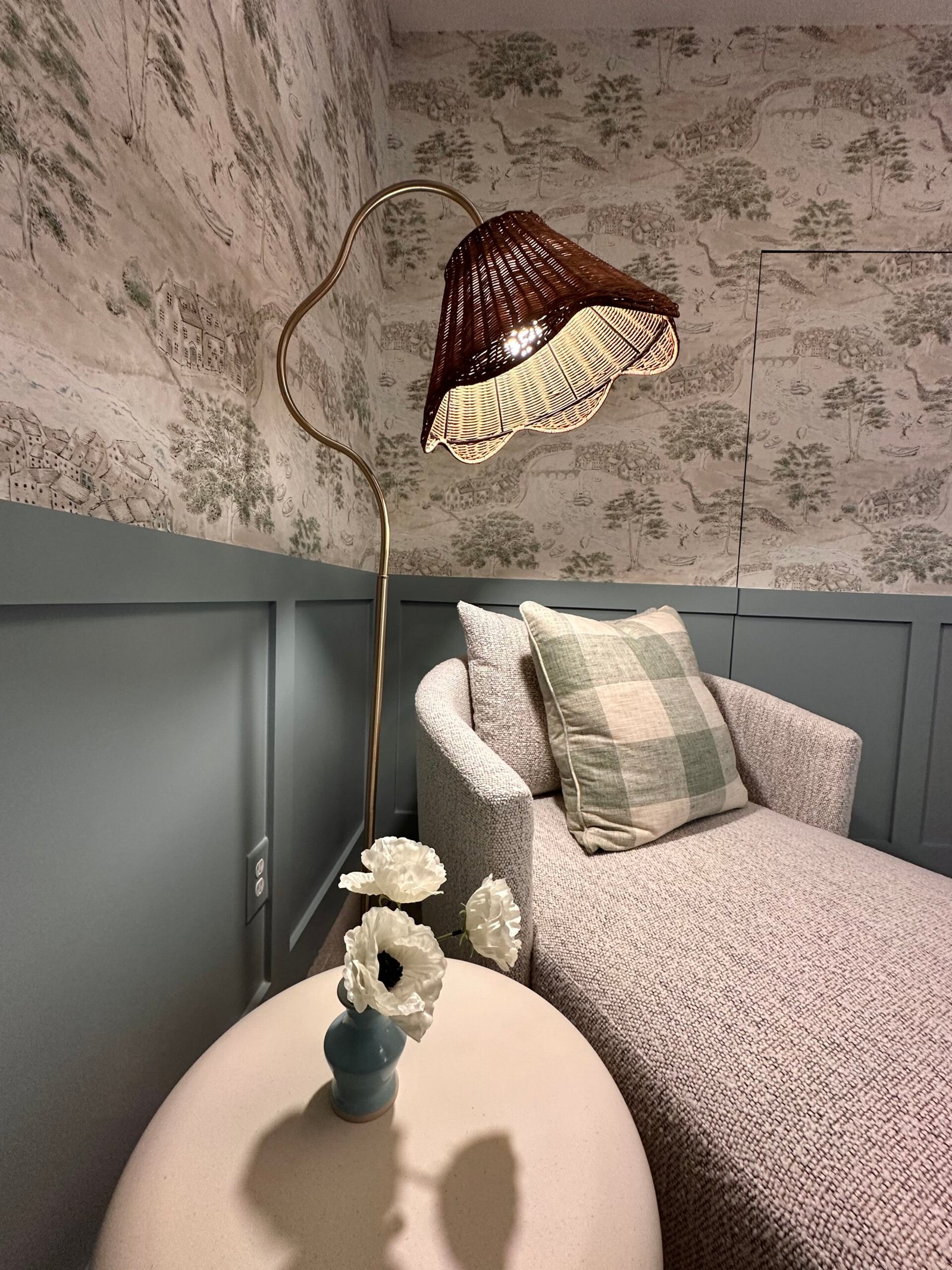 Living room wallpaper detail with table lamp — Houston install