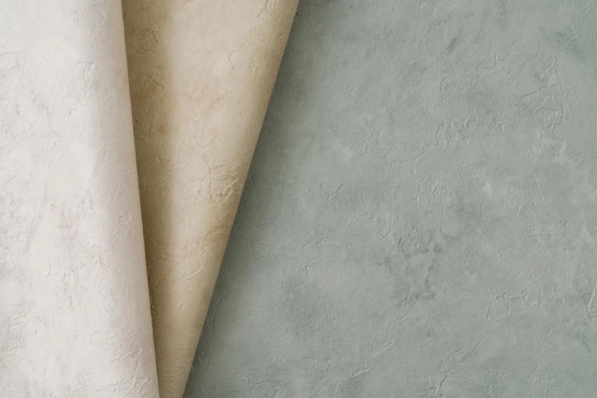 Cityscape wallcovering, shown in Quartzite, Sandwash, Jade