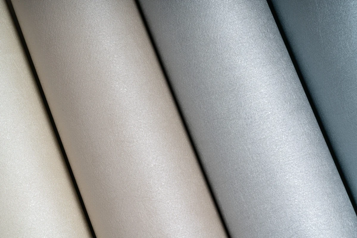 Enigma wallcovering, shown in Flax, Jute, Shale, Lake