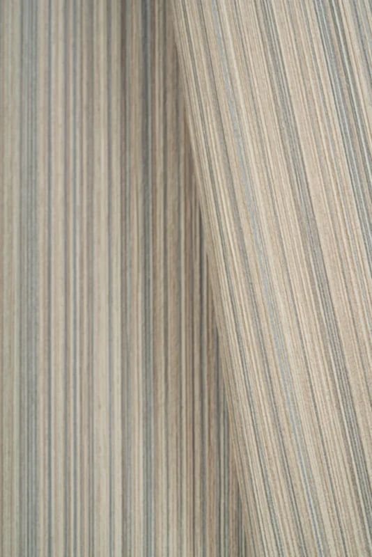Estria wallcovering, shown in Moonstone