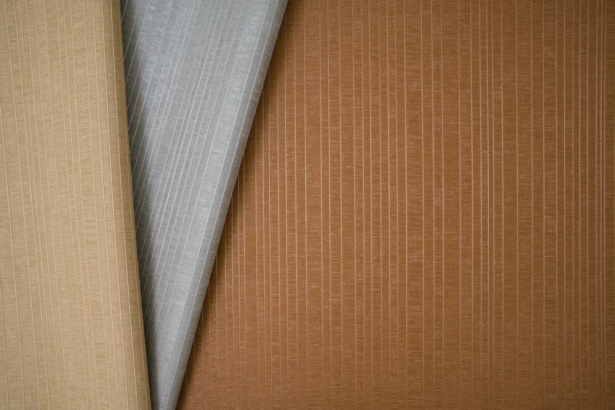 Kinetic Ridge wallcovering, shown in Bumble, Flash, Molten