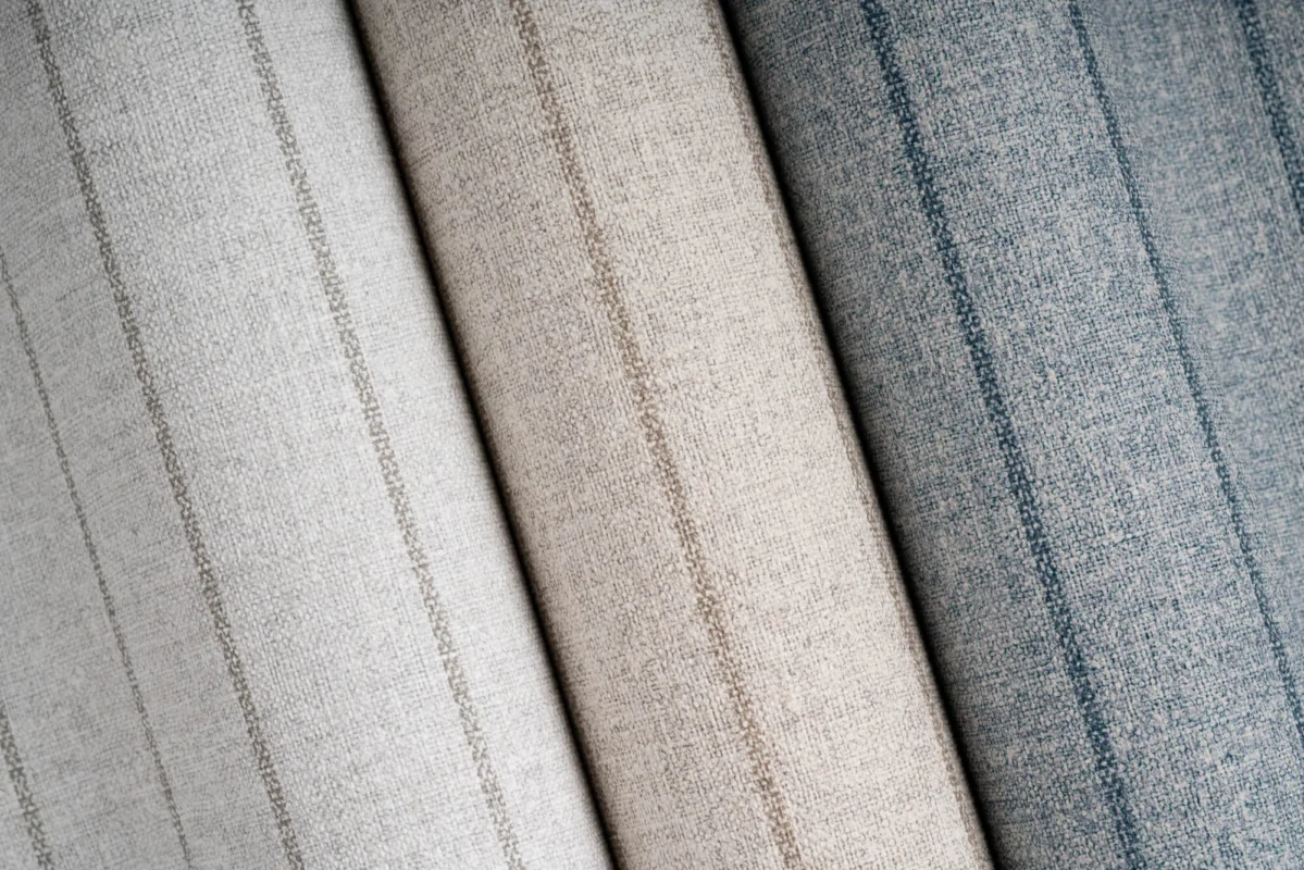 Linsey Stripe wallcovering, shown in Linum Stripe, Holland Stripe, Angora Stripe