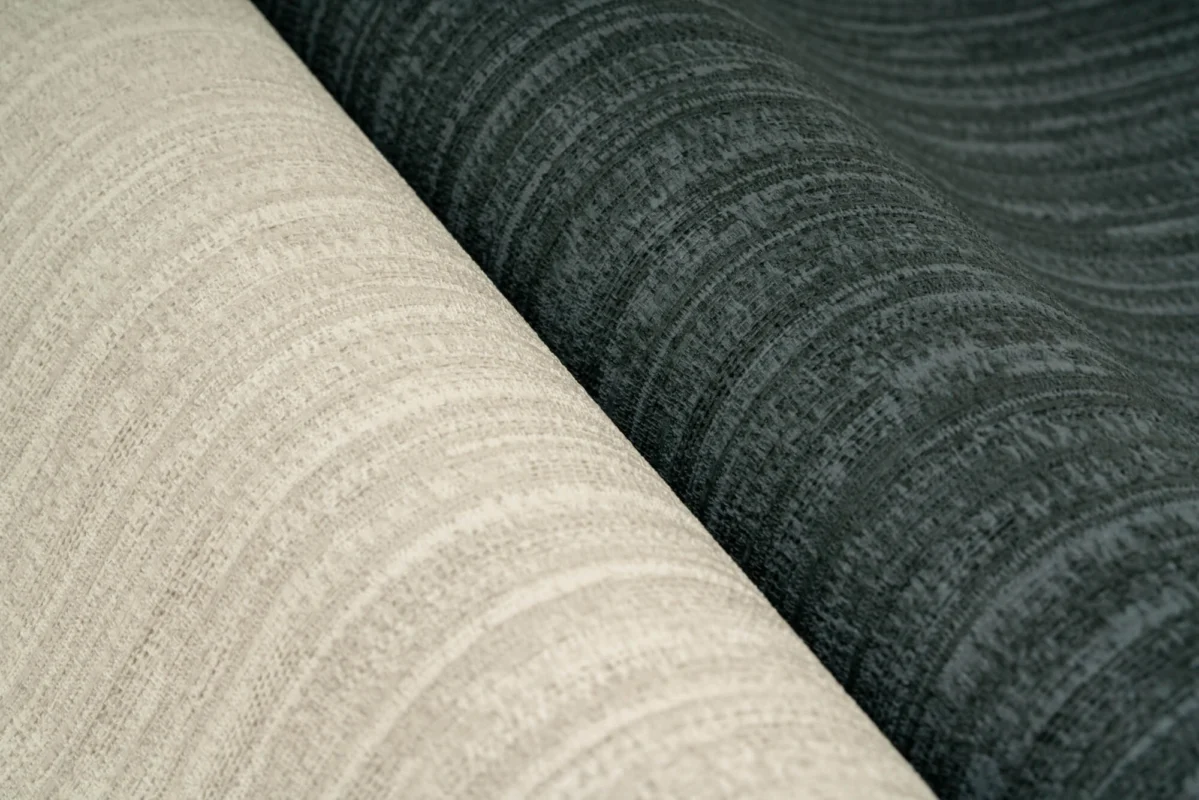 Marble Hill wallcovering, shown in Travertine Greige, Navy Bardiglio