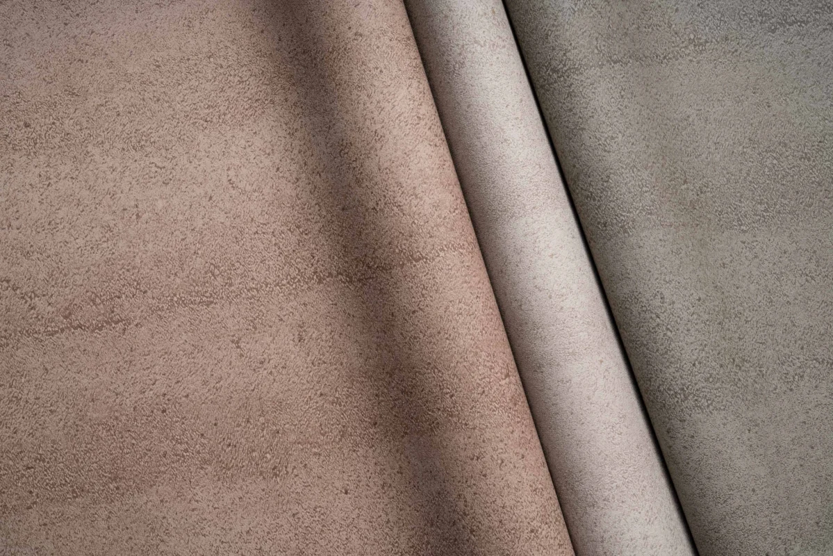 Rammed Earth wallcovering, shown in Sand, Tide, Clay