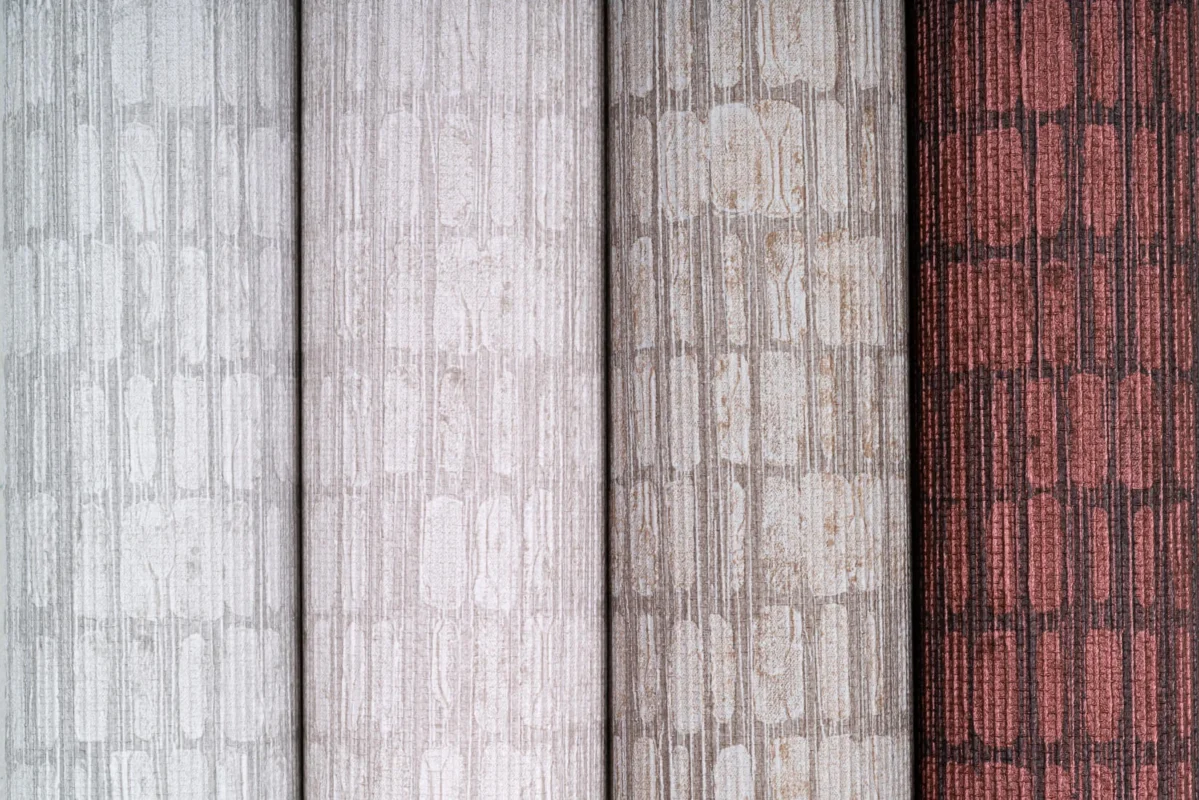 Stitched Sashiko wallcovering, shown in Overcast, Pampas Grass, No Waste, Persimmon Leaf