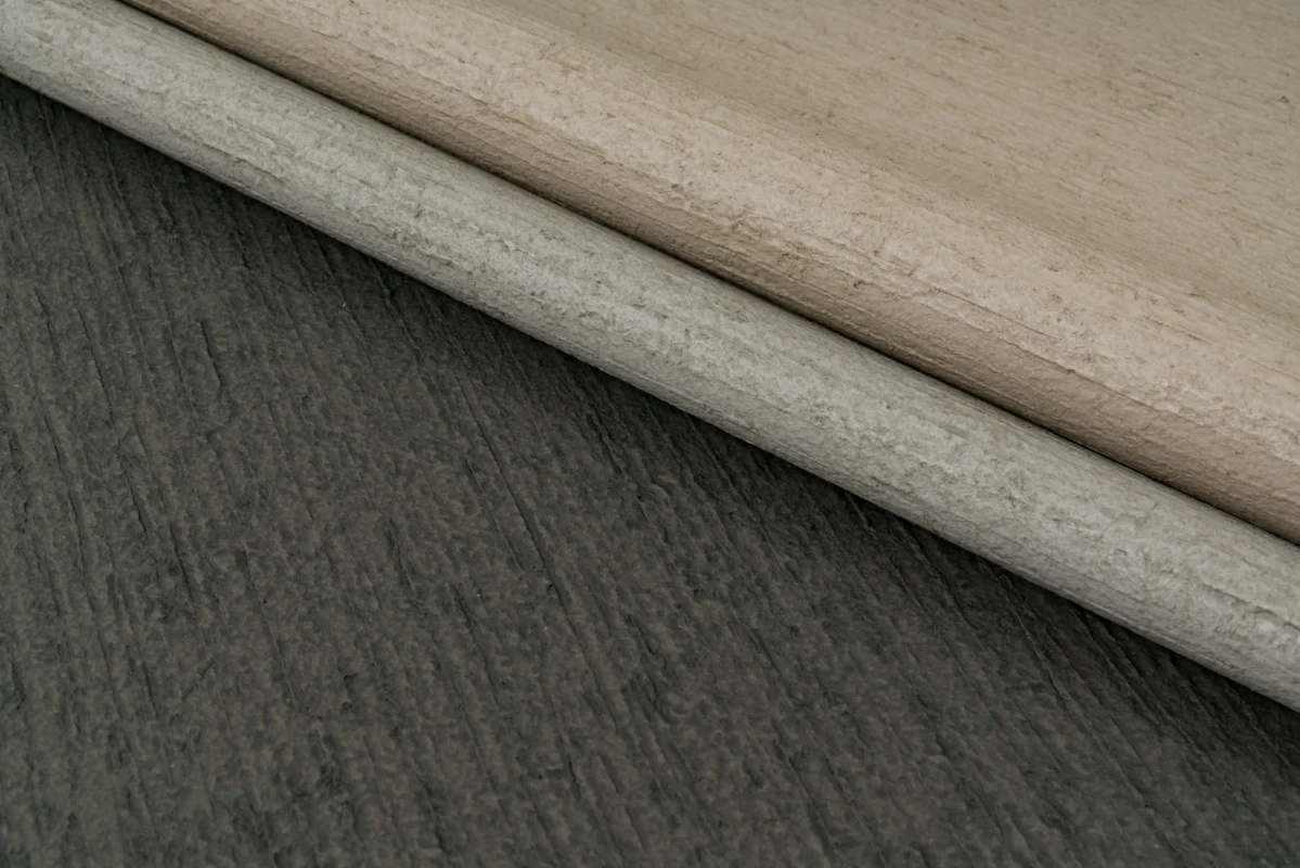 Stone Field wallcovering, shown in Toscana Taupe, Concrete, Carbon